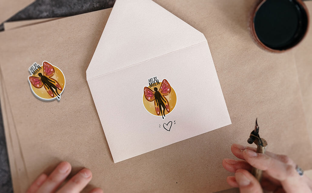 "Art by mein" logo sticker on an envelope.